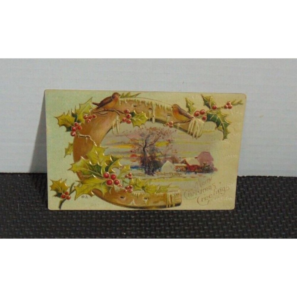 1900s MERRY CHRISTMAS Embossed Greetings Postcard farmhouse Holly 2c stamp